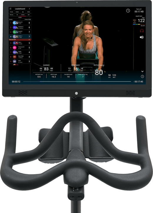 Instructor teaching a cycling class